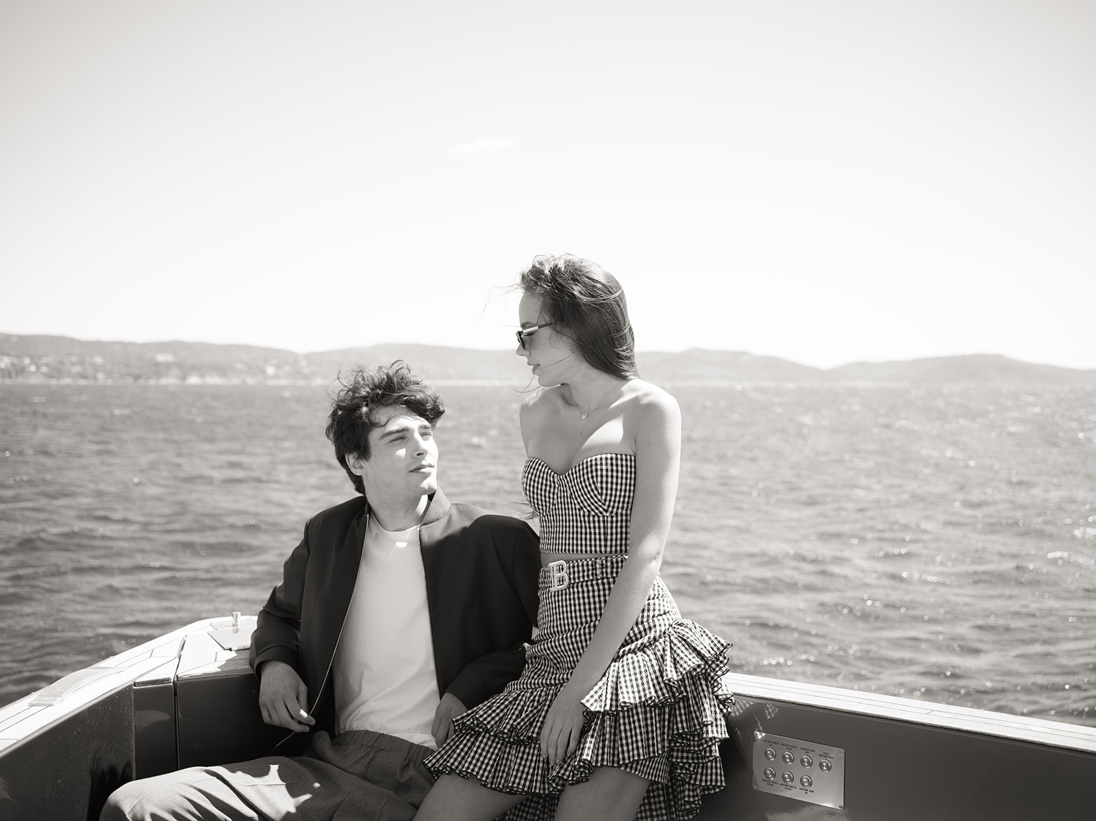 Black-and-white couple portrait on a yacht near Saint-Tropez